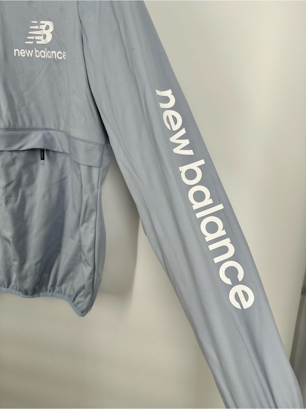 NEW BALANCE Women Windbreaker Pullover Hooded Jacket Light Blue - Picture 7 of 13